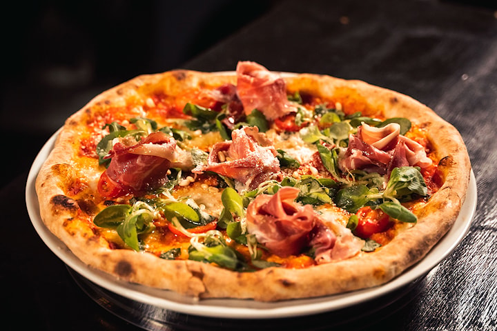 Nyt en deilig valgfri autentisk italiensk pizza hos Ghost på Majorstuen