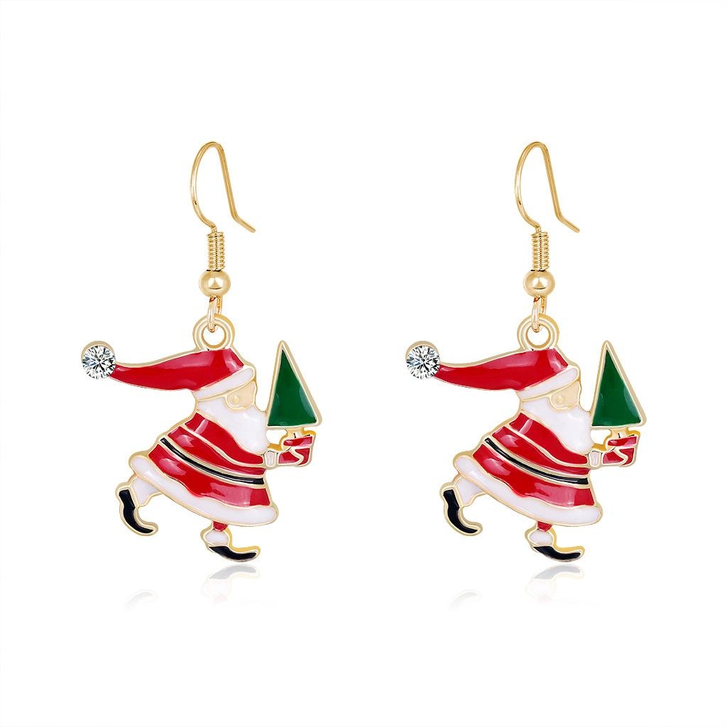 Product Image for Guldpläterat örhänge med jultomte som springer julgran