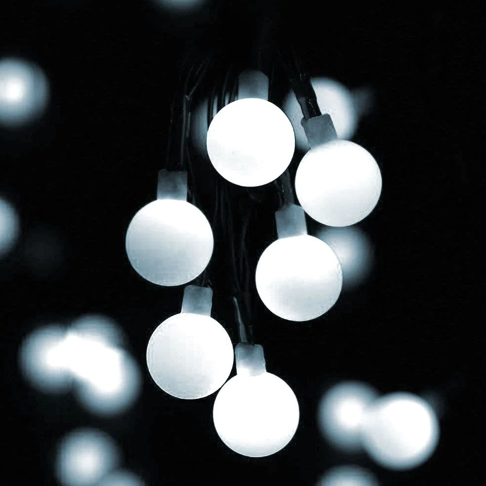 Solcellsdriven ljusslinga med 50 LED-lampor, vita eller flerfärgade (5 av 6)